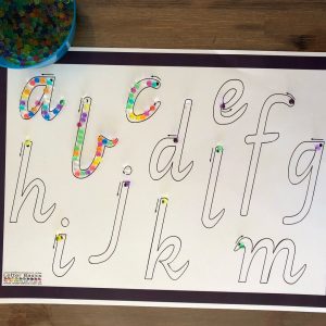 water beads on alphabet mat