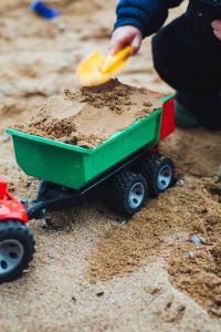 playing in sand pit