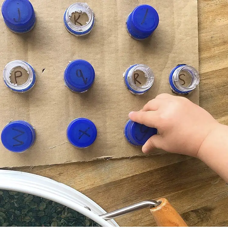 Bottle tops alphabet board