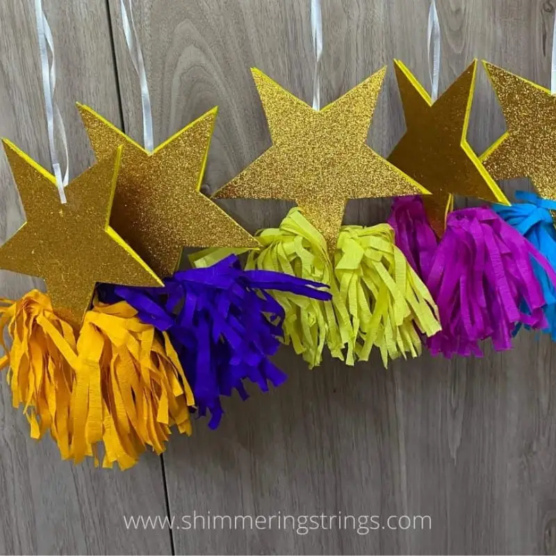 Shimmering star ornaments with tassels