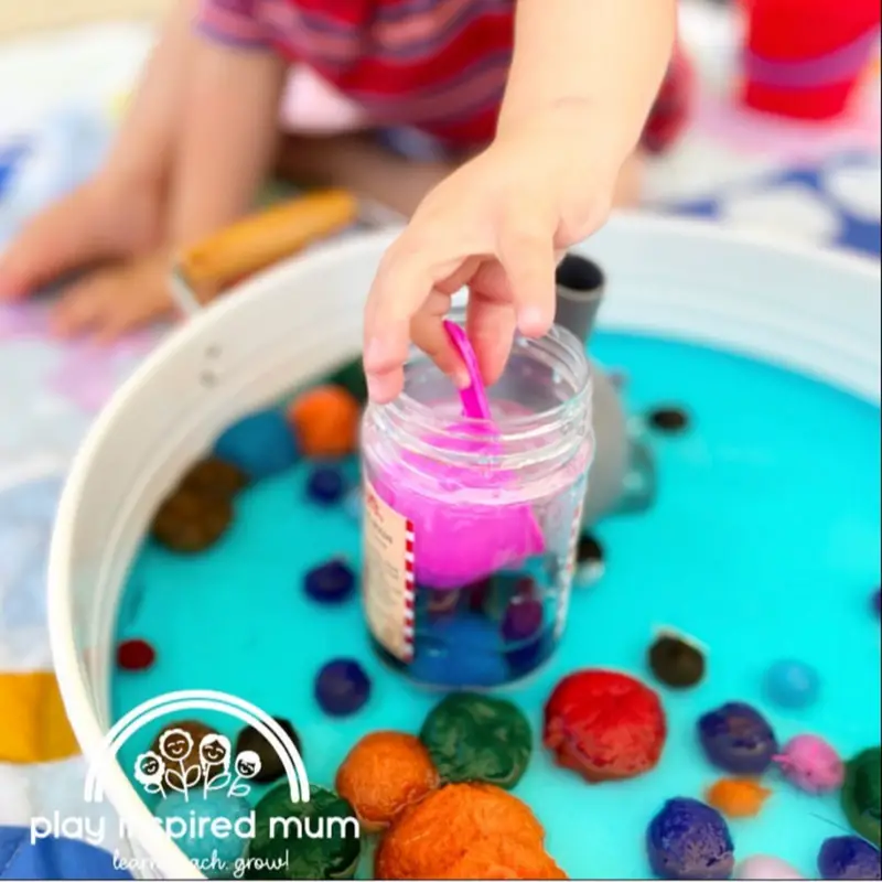 Pom pom soup sensory play