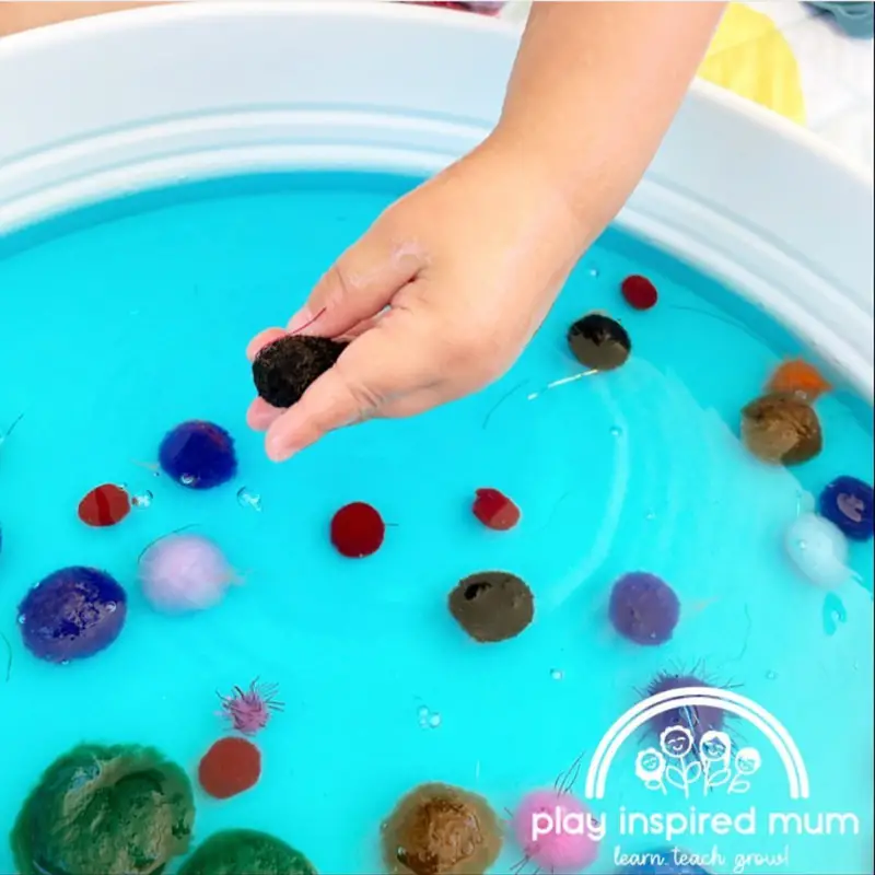 Pom pom soup sensory play