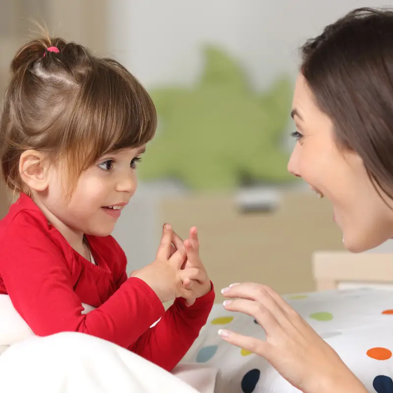 Daughter listening to mother tell a story