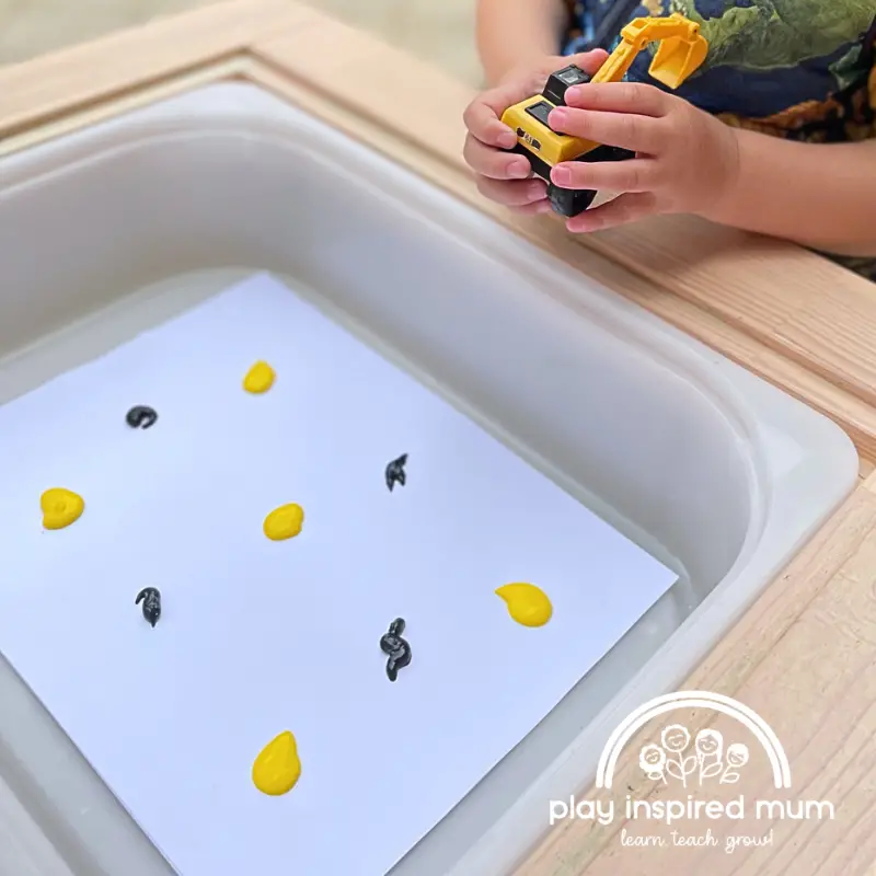 Paint blobs on paper construction truck painting for toddlers