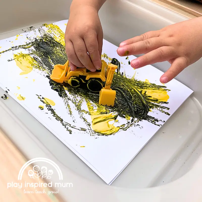 Construction truck painting with toddler