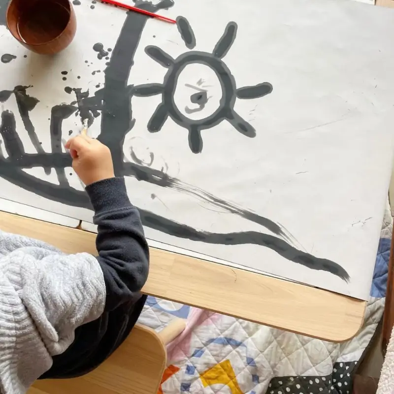 Indoor painting with waterproof play mat
