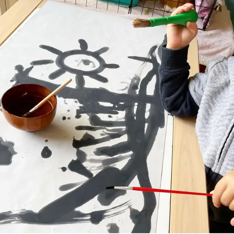 Magic writing mat painting with toddlers
