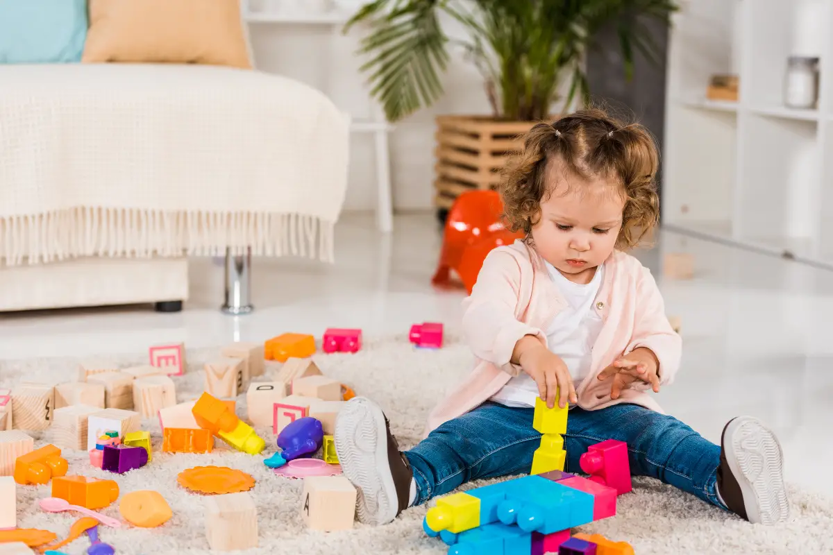 Easy fun learning activities 2 year olds toddler playing with blocks
