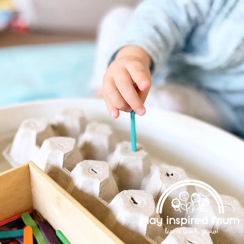 mini pop stick posting egg carton activity for toddlers